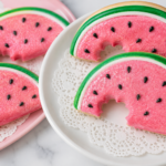 Fake watermelon cookies made with air dry foam clay decorated with glitter and realistic details